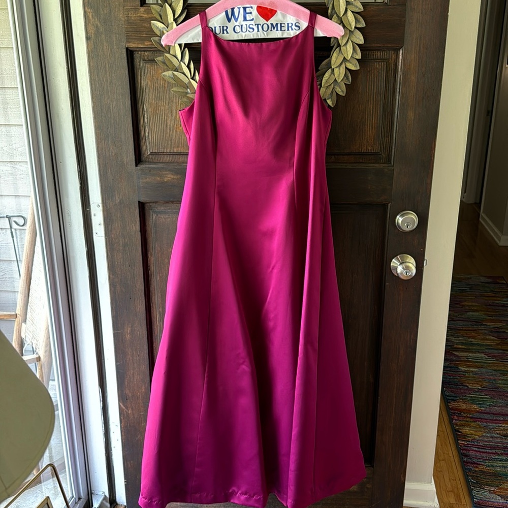 Beautiful gown with a little flare at the bottom. Worn once and dry cleaned.